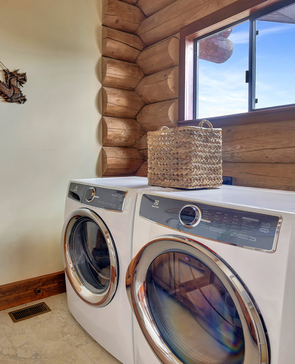 laundry room in log home